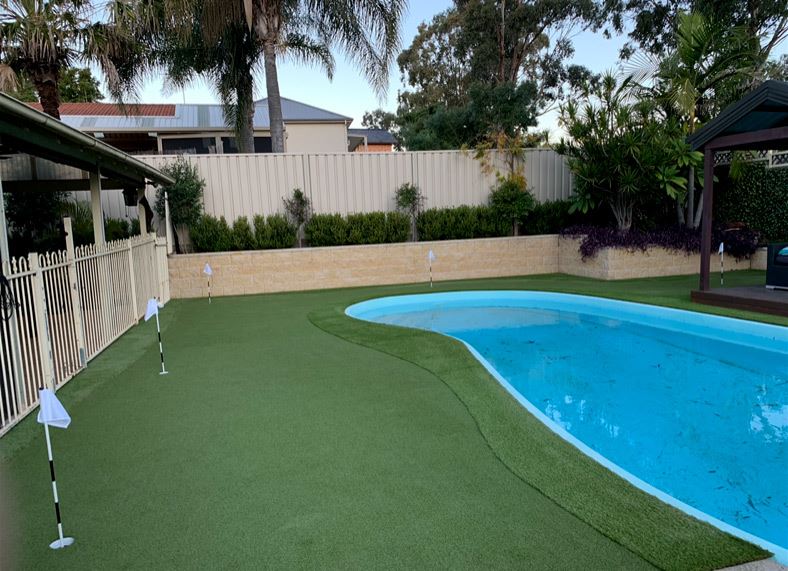 Backyard putting green with multiple holes